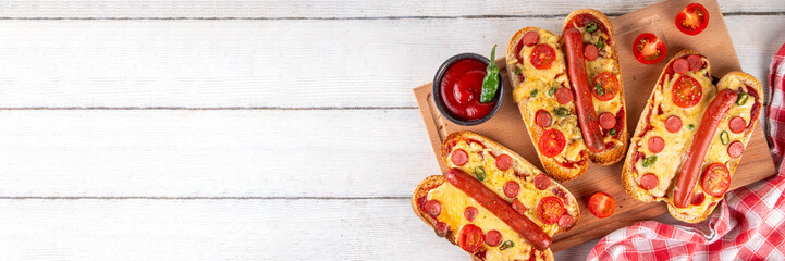 Tasty gourmet pizza dogs trendy viral combination recipe of hot dogs with hot sausage and pizza...