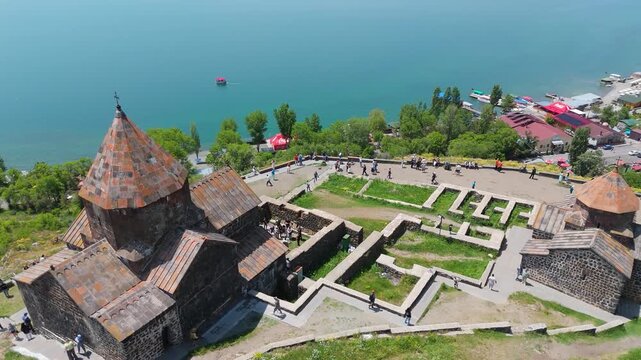 Aerial shot Sevanavanq near Sevan lake. Landscape of Lake Sevan, Gegharkunik Province, Armenia. Travel, touristic, adventure travel concept. Located in Akhtamar peninsula of Sevan lake.