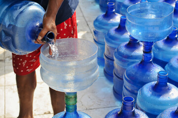 transferring drinking water from drinking water gallons