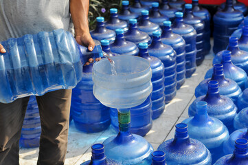 transferring drinking water from drinking water gallons