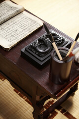 Old brushes and inkstones for calligraphy.
