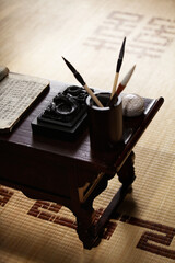 Old brushes and inkstones for calligraphy.
