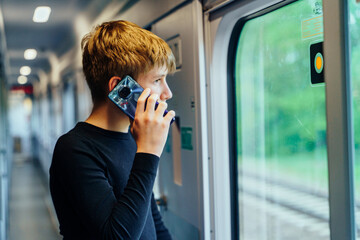 Phone call while looking outside train
