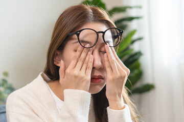 Eye problem concept, fatigue asian young woman tired eyes, irritated rubbing eye dry relief vision...