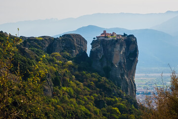 View of Meteora, rock formation and the Holy Trinity Monastery in the regional unit of Trikala, in Thessaly, in northwestern Greece. UNESCO World Heritage. 