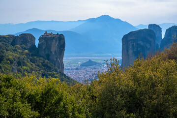 View of Meteora, rock formation and the Holy Trinity Monastery in the regional unit of Trikala, in Thessaly, in northwestern Greece. UNESCO World Heritage. 