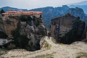 Visiting Meteora Monastery in the regional unit of Trikala, in Thessaly, northwestern Greece, one of the most impressive complexes of Eastern Orthodox monasteries. UNESCO World Heritage. 