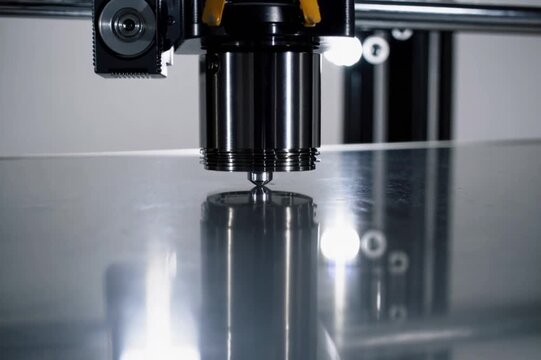 Slow-motion of printer bed auto-leveling before print starts &ndash; sensor movement and nozzle touchpoints in focus. Generative AI