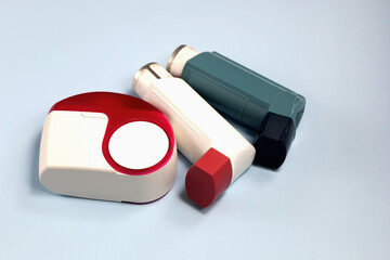 Various asthma inhalers on table