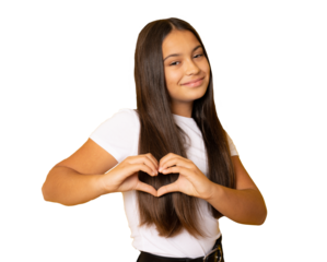 Young smiling girl in white t-shirt making a heart gesture with her fingers with a happy sincere smile isolated over transparent background. PNG.