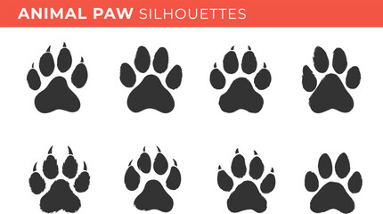 Set silhouettes of animal paw isolated on transparent background. Vector illustrations