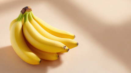 Fresh yellow bunch of banana fruit feeling healthy and pure. calm studio still life on beige surface with soft light and gentle shadow for clean aesthetic