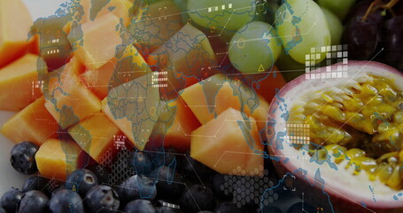 Showing melon cubes, green grapes, blueberries, halved passion fruit in studio with digital overlay