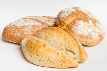 Homemade natural breads. Different kinds of fresh bread as background, perspective view with copy...