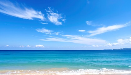 A Beautiful Ocean View with Turquoise Water, Sandy Beach and Fluffy Clouds