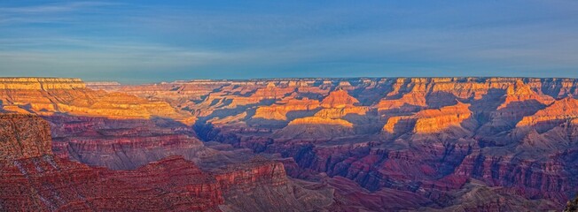 Wide Grand Canyon panorama with snowy rim