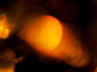 Colorful light leaks on black background for design and special effects. Retro film look. Abstract...