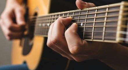 Obraz premium Detailed Close-up of Hands Playing an Acoustic Guitar Fretboard, Emphasizing Musicality, Practice, and Passion for Music
