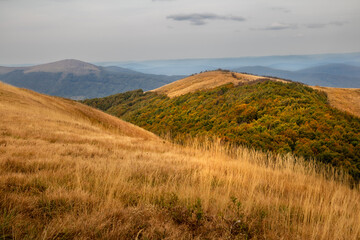 Golden autumn landscape of Bieszczady Mountains with panoramic view of Wielka Rawka and Mala Rawka...
