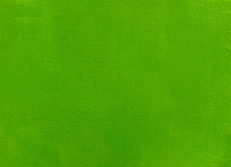 Bright green textured backdrop, featuring smooth and even surface, perfect for use in design...