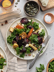 Top view healthy vegetarian dinner with root vegetables salad