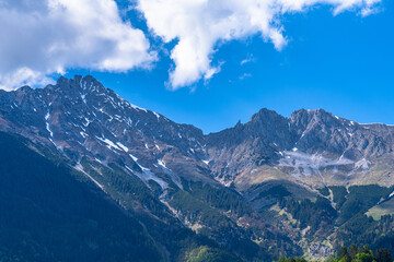 Panorama view of Hafelekarspitze and Seegrubenspitze peaks of Nordkette mountain from Innsbruck in spring, Innsbruck, Tyrol, Austria