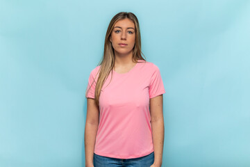 Young woman wearing pink t-shirt promoting breast cancer awareness