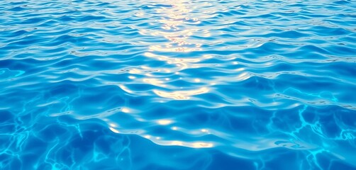 Obraz premium Shimmering blue water surface with gentle ripples and subtle wave patterns, glassy water, water
