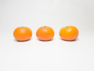 Orange fruit isolated on a white background.