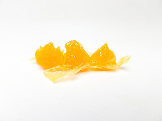 Fresh orange slices and a halved mandarin on a clean white background. Juicy and vibrant citrus...