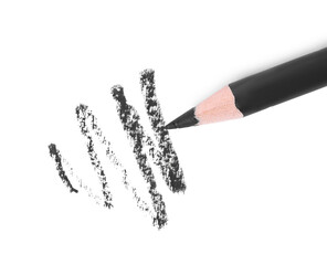 Black eyebrow pencil and strokes isolated on white, top view
