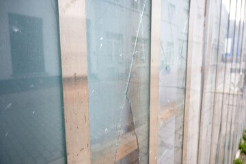 Building with dirty glass in broken window.