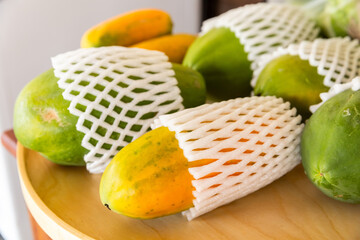 Papaya with packing foam