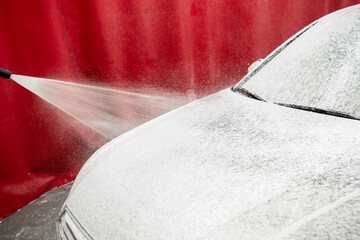 Car Foaming Stage. High-pressure snow foam application ensures deep cleaning and softens grime on...