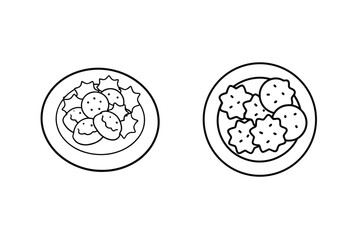 Round and star shaped cookies on plates baked goods