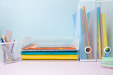 Office desk table with colorful stationery. Back to school concept.