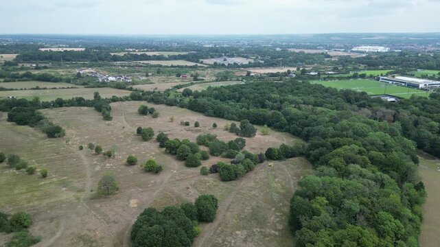 Aerial drone footage of Whitewebbs Park in Enfield, North London. Captures scenic green space targeted for development by Tottenham Hotspur. Filmed with DJI Mini 3 Pro in high resolution.