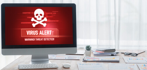 Virus warning alert on computer screen detected brisk cyber threat , hacker, computer virus and...