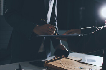 Lawyer explained to the client about the law that must be brought against the court case.