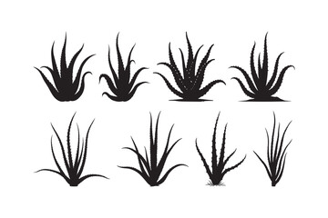 Collection of black silhouette grass clumps on white background