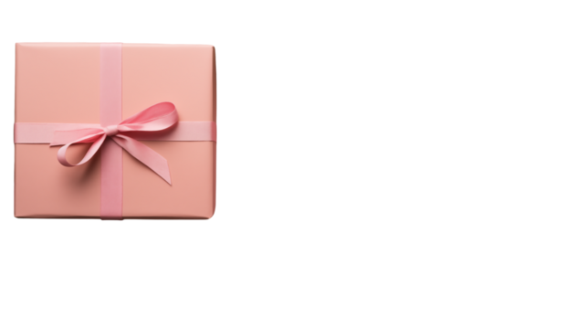 Elegant peach gift box with delicate pink ribbon bow ready for celebration