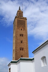 Fototapeta premium Rabat, Morocco. The huge minaret of the Great Mosque. Also known as the el-Kharrazin Mosque. Built in the Marinid period in the late 13th or early 14th century, but has undergone several restorations.