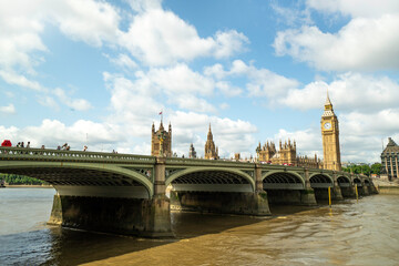 Big Ben tower of Houses of Parliament and Westminster pier, Lond