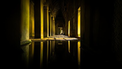 Mysterious dimly lit corridor with reflections in water