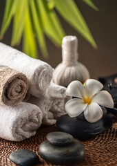 Folded Towels and Stones for Spa Treatment  