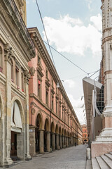 A street italy, wooden, architecture, door, culture, journey, drive, tourism, europe with a building on the right side of the street