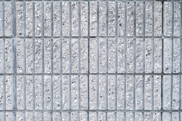 Brick wall with gray bricks