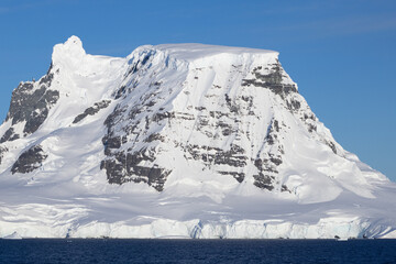 The mountains on Antarctica meeting the Southern Ocean © Allen Penton