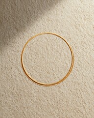 Gold Minimalist Circle Necklace on Sand Jewelry Photography