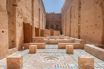 A wide-angle view of the vast central courtyard of the El Badi Palace  in Marrakech, Morocco. 